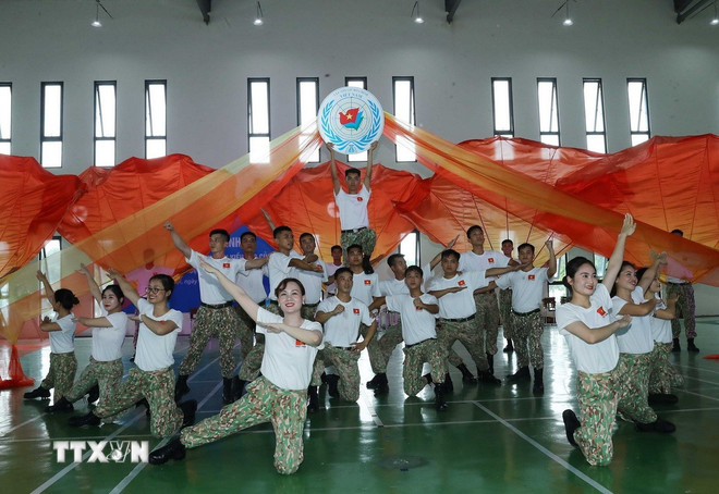 ttxvn-2507-thanh-nien-kieu-bao-gin-giu-hoa-binh-3.jpg
