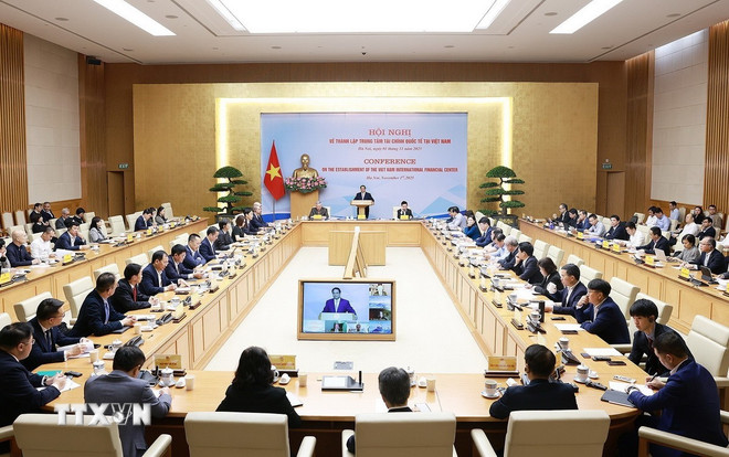 Thủ tướng chủ trì Hội nghị về thành lập Trung tâm tài chính quốc tế tại Việt Nam ttxvn-0111-thu-tuong-trung-tam-tai-chinh-quoc-te-2.jpg