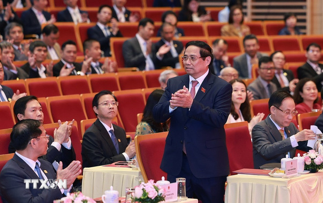 នាយករដ្ឋមន្ត្រី Pham Minh Chinh ចូលរួមមហាសន្និបាតអ្នកស្នេហាជាតិនៃក្រសួងការបរទេស អាណត្តិ 2025-2030។ (រូបថត៖ Duong Giang/VNA) ttxvn-1011-thu-tuong-dai-hoi-thi-dua-bo-ngoai-giao-3.jpg
