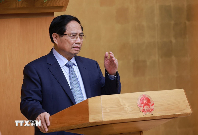 Thủ tướng Phạm Minh Chính chủ trì họp đánh giá kết quả vận hành mô hình chính quyền địa phương hai cấp. (Ảnh: Dương Giang/TTXVN) ttxvn-0110-thu-tuong-chinh-quyen-2-cap-6.jpg