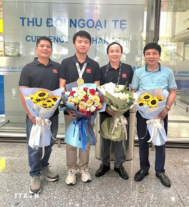 ttxvn-0608-olympic-toan-quoc-te-vo-trong-khai-2.jpg