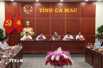 Lãnh đạo hai tỉnh Cà Mau và Bạc Liêu dự Hội nghị. (Ảnh: Kim Há/TTXVN)