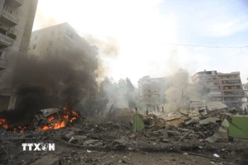 Tòa nhà bị phá hủy sau cuộc không kích của Israel tại Beirut, Liban. (Nguồn: THX/TTXVN)