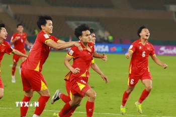Minh Phúc số 21 ghi bàn ấn định tỷ số 3-2 cho U23 Việt Nam. (Ảnh: Nguồn AFC/TTXVN phát)