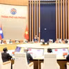 Hội nghị tư pháp các tỉnh có chung đường biên giới Việt Nam-Lào mở rộng lần thứ 7 tại Hải Phòng. (Ảnh: Mạnh Tú/TTXVN)