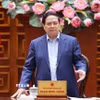 Thủ tướng Phạm Minh Chính chủ trì họp khắc phục hậu quả thiên tai sau bão. (Ảnh: Dương Giang/TTXVN)