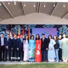 Các cán bộ, nhân viên, phu quân, phu nhân Đại sứ quán Việt Nam tại Pretoria và các cơ quan bên cạnh tham dự Lễ kỷ niệm. (Ảnh: Hồng Minh/TTXVN)