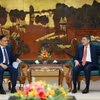Thủ tướng Lê Minh Hưng tiếp Phó Thủ tướng, Bộ trưởng Tài chính Lào Santiphab Phomvihane. (Ảnh: Dương Giang/TTXVN)