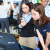 Các doanh nghiệp tại Khu công nghiệp Long Hậu (xã Cần Giuộc, tỉnh Tây Ninh) tìm hiểu giải pháp số hóa dữ liệu, truy xuất nguồn gốc đáp ứng yêu cầu trong giai đoạn mới. (Ảnh: Bùi Giang/TTXVN)