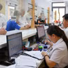 Người dân đến giải quyết thủ tục hành chính tại Trung tâm Phục vụ Hành chính công phường Đồng Xoài, tỉnh Đồng Nai. (Ảnh minh họa: Nhật Bình/TTXVN)