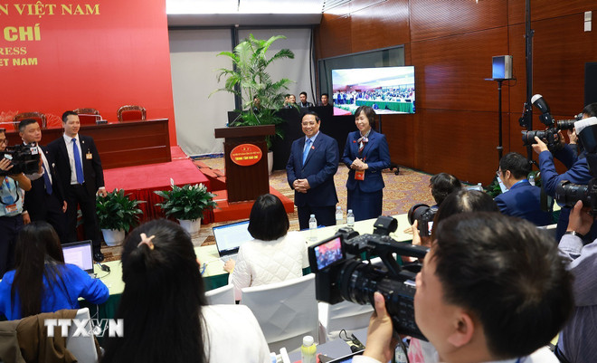 ttxvn-thu-tuong-tham-trung-tam-bao-chi-dai-hoi-xiv-2.jpg