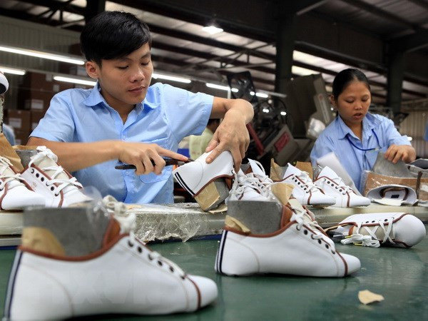 (Ảnh: Trần Việt/TTXVN) Thị trường lao động năm 2023: Cần duy trì nguồn nhân lực có tay nghề ảnh 1