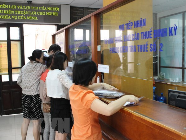 (Ảnh minh hoạ: TTXVN) Sửa Luật Quản lý thuế: Tránh lợi dụng phá sản để được xoá nợ thuế ảnh 1