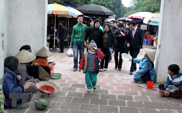 Kiểm tra, xử nghiêm trường hợp ép buộc trẻ em, người khuyết tật xin ăn ảnh 1