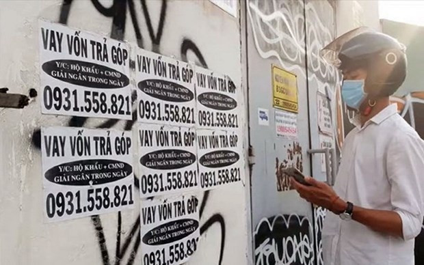 Giải cứu công nhân trước ma trận “tín dụng đen” ảnh 1