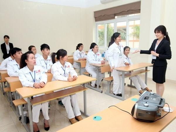 Lao động học tiếng Nhật trước khi sang Nhật Bản làm việc. (Ảnh: TTXVN) Tuyển chọn hàng trăm thực tập sinh đi Nhật Bản, không mất phí môi giới ảnh 1