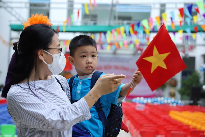 Mục tiêu của Tháng hành động vì trẻ em năm 2023 nhằm xây dựng môi trường sống an toàn, thân thiện, lành mạnh để thực hiện đầy đủ quyền trẻ em. (Ảnh: PV/Vietnam+) Tháng hành động vì trẻ em 2023: 'Chung tay giảm thiểu tổn hại trẻ em' ảnh 3