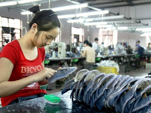 (Ảnh minh họa: TTXVN) Đối thoại tại nơi làm việc là “chìa khóa” để tăng năng suất lao động ảnh 1