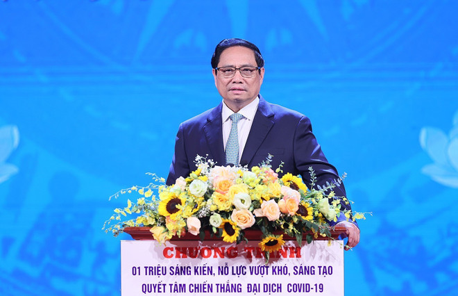 Thủ tướng Phạm Minh Chính phát biểu tại Lễ tôn vinh điển hình “Sáng kiến vượt khó, sáng tạo, chiến thắng đại dịch”. (Ảnh: Dương Giang/TTXVN) Hơn 2 triệu sáng kiến của đoàn viên, lao động làm lợi 33.000 tỷ đồng ảnh 1