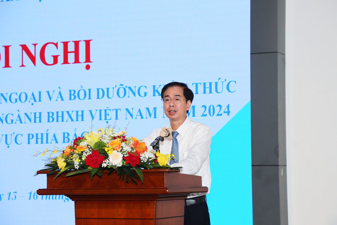 Ông Đào Việt Ánh, Phó Tổng Giám đốc Bảo hiểm xã hội Việt Nam phát biểu tại hội nghị. (Ảnh: PV/Vietnam+) PTGĐ Đào Việt Ánh phát biểu tại hội nghị.jpg