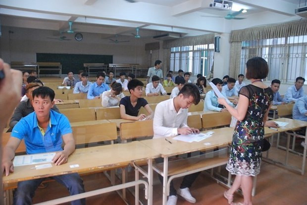 Kỳ thi tiếng Hàn để tuyển chọn lao động sang Hàn Quốc làm việc được tổ chức hàng năm. (Ảnh: PV/Vietnam+) Miễn xử phạt lao động bất hợp pháp tại Hàn Quốc tự nguyện về nước ảnh 3