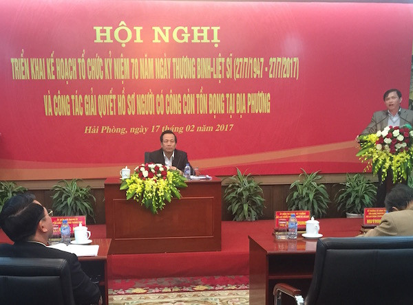 Hội nghị sơ kết thí điểm giải quyết hồ sơ người có công tồn đọng. (Ảnh: PV/Vietnam+) Giải quyết công nhận người có công: Người dân chính là hồ sơ gốc ảnh 2