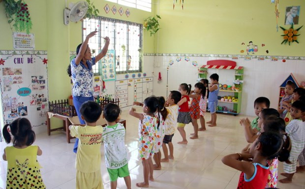 (Ảnh minh họa: Phạm Minh Tuấn/TTXVN) Đề xuất không tăng tuổi nghỉ hưu của giáo viên mầm non lên 60 ảnh 1