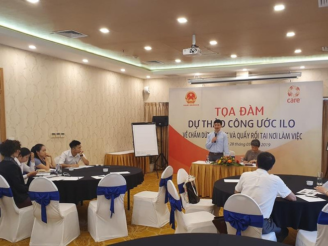 Tọa đàm Dự thảo Công ước của ILO về chấm dứt bạo lực và quấy rối trong công việc. (Ảnh: PV/Vietnam+) Việt Nam tham gia đàm phán Công ước mới của ILO về quấy rối tình dục ảnh 1