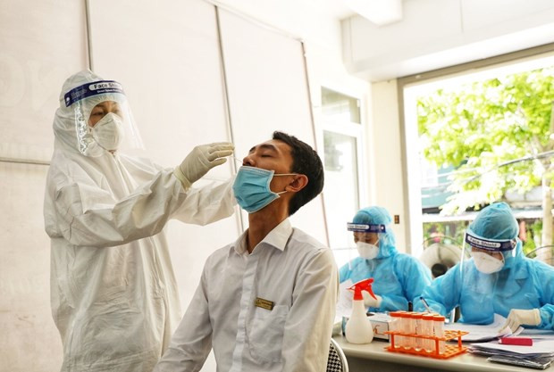 Bổ sung COVID-19 là bệnh nghề nghiệp: Cần mở rộng đối tượng hưởng ảnh 1