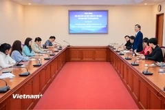 Báo Điện tử VietnamPlus chia sẻ kinh nghiệm với Hội Nhà báo Lào