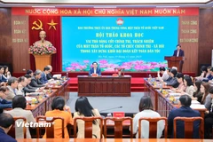 Hội thảo khoa học vai trò nòng cốt chính trị, trách nhiệm của Mặt trận Tổ quốc, các tổ chức chính trị - xã hội trong xây dựng khối đại đoàn kết toàn dân tộc sáng 19/12. (Ảnh: Hoài Nam/Vietnam+)