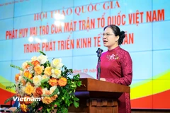 Bà Hà Thị Nga, Ủy viên Trung ương Đảng, Phó Chủ tịch Ủy ban Trung ương Mặt trận Tổ quốc Việt Nam phát biểu khai mạc Hội thảo. (Ảnh: Hoài Nam/Vietnam+)