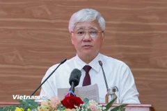 Ông Đỗ Văn Chiến, Ủy viên Bộ Chính trị, Bí thư Trung ương Đảng, Bí thư Đảng ủy Mặt trận Tổ quốc, các đoàn thể Trung ương, Chủ tịch Ủy ban Trung ương Mặt trận Tổ quốc Việt Nam trình bày báo cáo tại cuộc làm việc. (Ảnh: PV/Vietnam+)