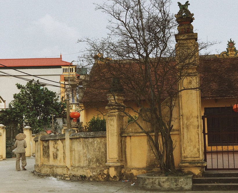 Những ngôi nhà tại làng Cựu là sự giao thoa giữa hai phong cách Á-Âu, tráng lệ có, bình dân có; sự hào hoa phố xá, yên bình kết hợp hài hòa. (Ảnh: PV/Vietnam+)