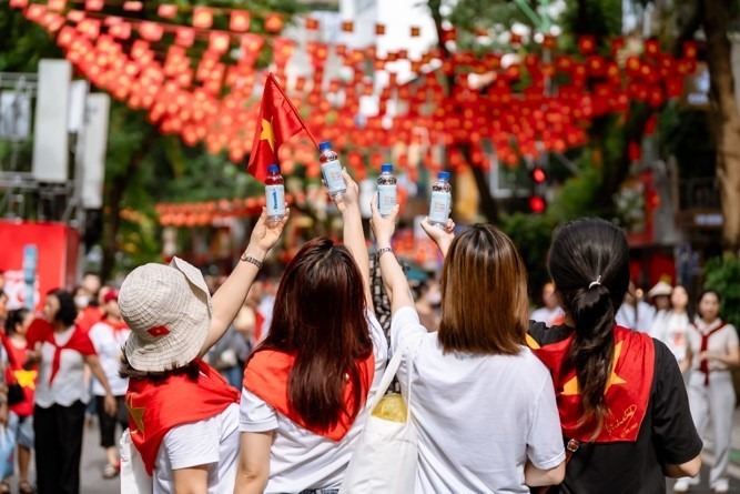 Vinamilk đồng hành cùng triệu trái tim Việt, góp mặt trong từng niềm vui nhỏ của đại lễ lớn. (Ảnh: Vi Nam/Vietnam+)