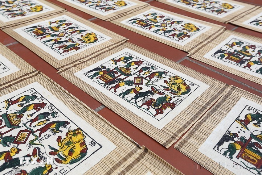 UNESCO ghi danh Nghề làm tranh dân gian Đông Hồ vào Danh sách Di sản văn hóa phi vật thể cần bảo vệ khẩn cấp. Đây là di sản thứ 17 của Việt Nam được UNESCO ghi danh vào các Danh sách Di sản Văn hóa Phi vật thể của UNESCO. (Ảnh: TTXVN)