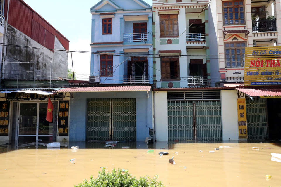 Một số khu vực trên địa bàn xã Thất Khê vẫn còn ngập sâu, dự kiến tối 8/10 nước sẽ rút hết. (Ảnh: Văn Đạt/TTXVN)