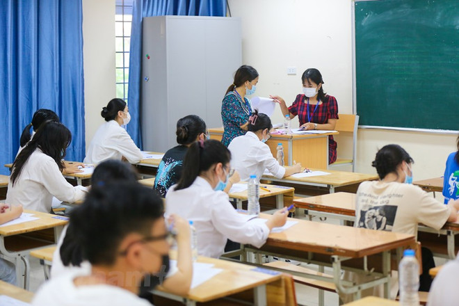 Thí sinh dự thi tốt nghiệp trung học phổ thông. (Ảnh: Minh Sơn/Vietnam+) Bật mí chiến lược điều chỉnh nguyện vọng xét tuyển đại học năm 2021 ảnh 2