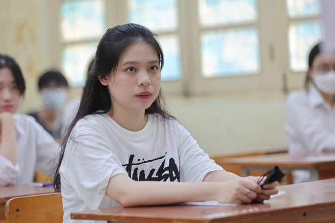 Thí sinh dự thi tốt nghiệp trung học phổ thông năm 2022. (Ảnh: Hoài Nam/Vietnam+) Tra cứu điểm thi tốt nghiệp THPT 2022 trên Báo Điện tử VietnamPlus ảnh 1
