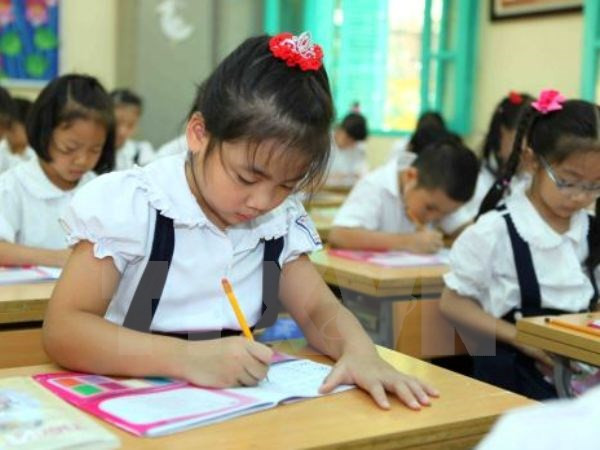 Sách giáo khoa mới sẽ được triển khai trên cả nước từ năm học 2020-2021, bắt đầu từ lớp 1. (Ảnh: TTXVN) Chiều nay, Bộ Giáo dục chính thức công bố sách giáo khoa lớp 1 mới ảnh 2