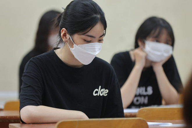 Thí sinh dự thi tốt nghiệp trung học phổ thông năm 2022. (Ảnh: Hoài Nam/Vietnam+) Xét tuyển đại học 2022: Lúng túng với phần mềm lọc ảo chung ảnh 1