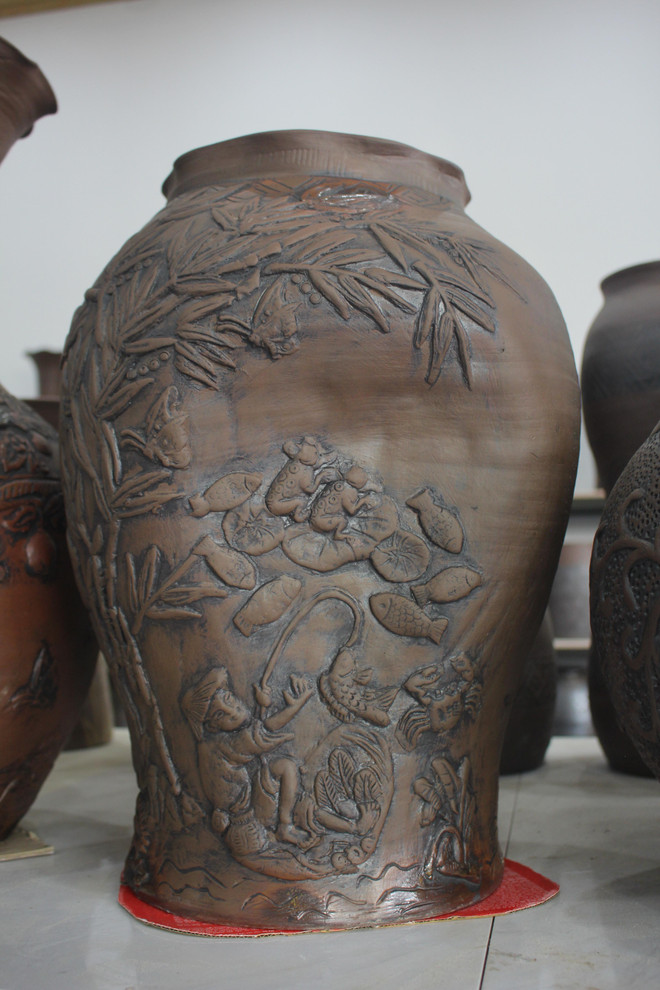 Nghệ nhân Giang Thị Nhạn: 'Nặn cuộc đời' trên gốm Hương Canh ảnh 2