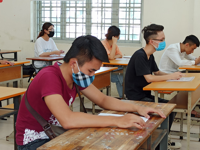 Thí sinh dự thi tốt nghiệp trung học phổ thông. (Ảnh: Phạm Mai/Vietnam+) Các bộ, ngành, địa phương phối hợp tổ chức tốt kỳ thi tốt nghiệp THPT ảnh 1