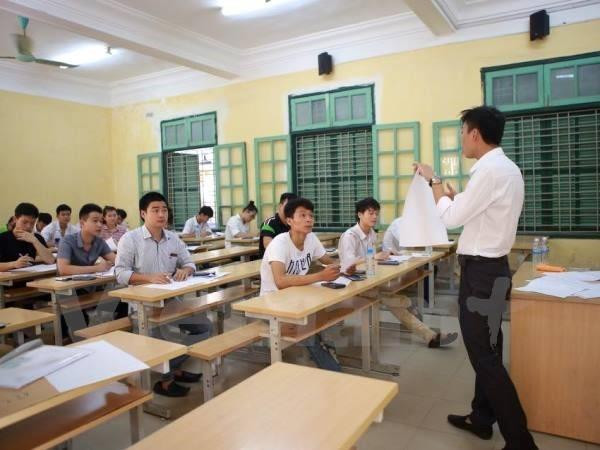 Thí sinh dự thi Trung học phổ thông quốc gia. (Ảnh: Minh Sơn/Vietnam+) 5 thí sinh gian lận điểm ở Hòa Bình đỗ Đại học Kinh tế Quốc dân ảnh 1