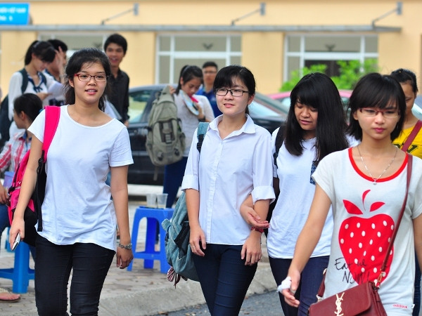 Thí sinh dự thi đại học năm 2014. (Ảnh: Xuân Mai/Vietnam+) Tuyển sinh năm 2015: Đại học Thương mại bất ngờ “khai tử” khối A ảnh 1