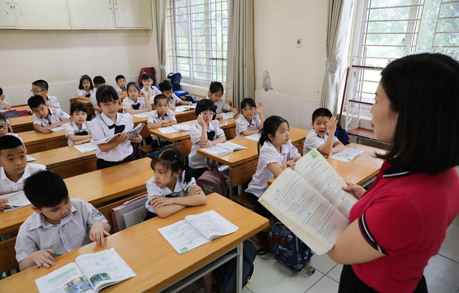 (Ảnh minh họa: TTXVN) Bộ GD-ĐT đề nghị địa phương cấp độ dịch 1, 2 tổ chức học trực tiếp ảnh 1