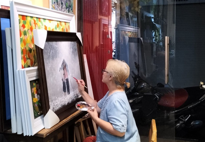 Triển lãm ‘Cọ non’ chào mừng 77 năm thành lập Thông tấn xã Việt Nam ảnh 2