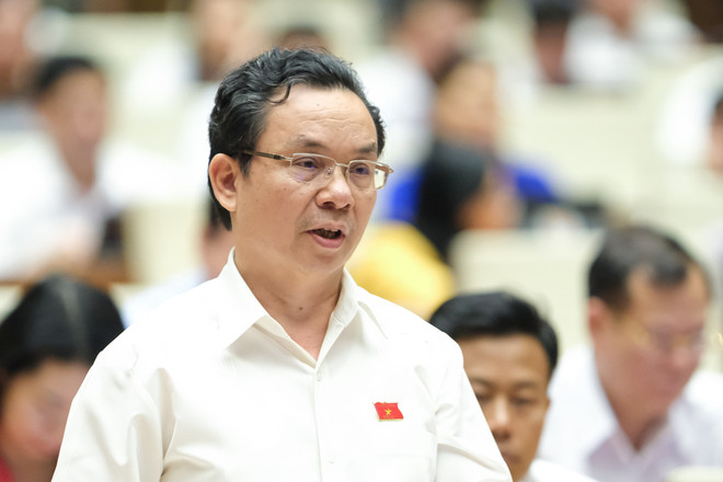 Đại biểu Hoàng Văn Cường, Đoàn Đại biểu Quốc hội Hà Nội phát biểu tại kỳ họp. (Ảnh: PV/Vietnam+) Nghị trường ‘nóng’ về vấn đề quản lý xây dựng nhà chung cư mini ảnh 2