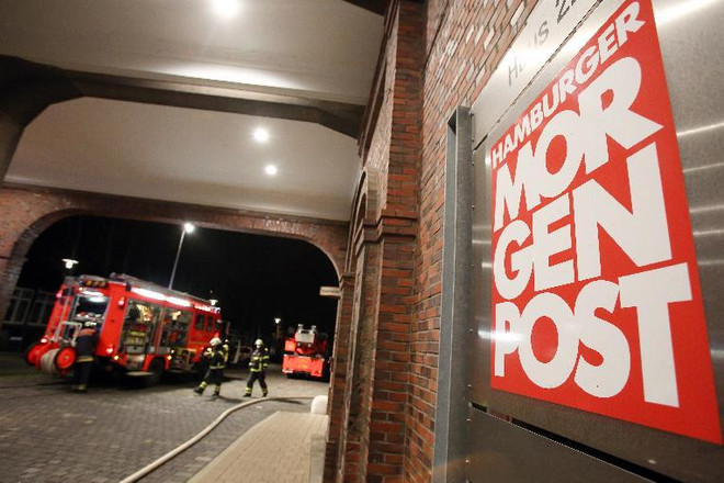 Nhật báo Đức đăng hình biếm họa của Charlie Hebdo bị phóng hỏa ảnh 1