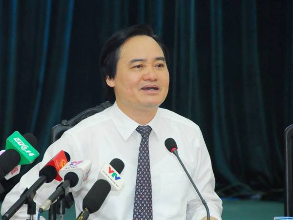 Bộ trưởng Phùng Xuân Nhạ. (Ảnh: CTV/Vietnam+) Ba vấn đề nóng sẽ được Quốc hội chất vấn Bộ trưởng Bộ Giáo dục ảnh 1